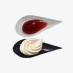 Mise en bouche cuillère goute blanche et noire